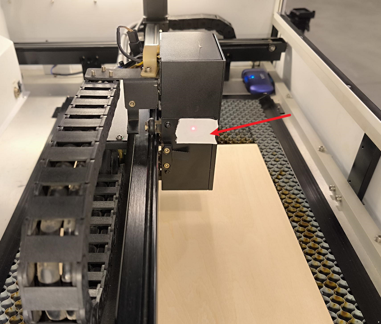 Double-sided tape applied to mirror mount for beam testing