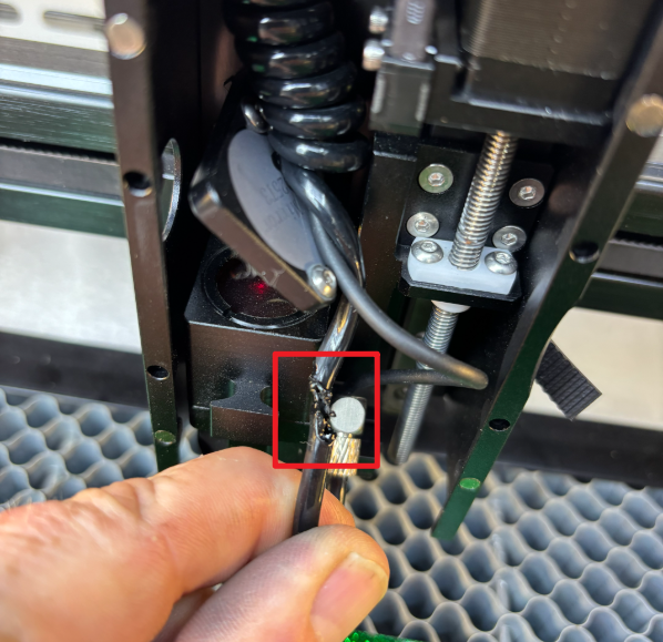 Damaged air tube inside laser head