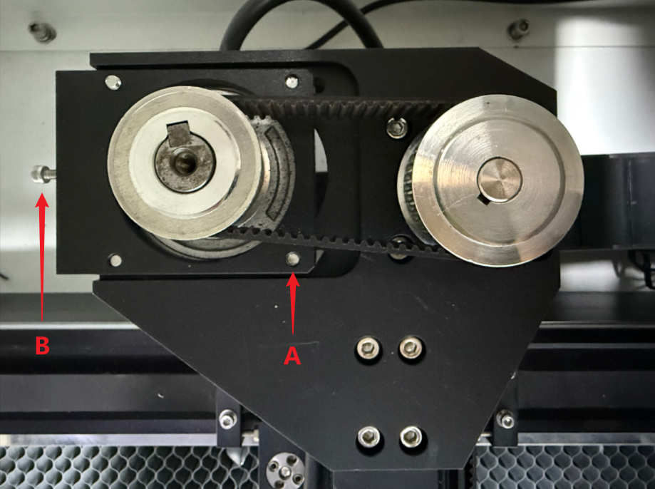 Illustration showing adjustment of the X-axis drive belt tension on OneLaser X Series