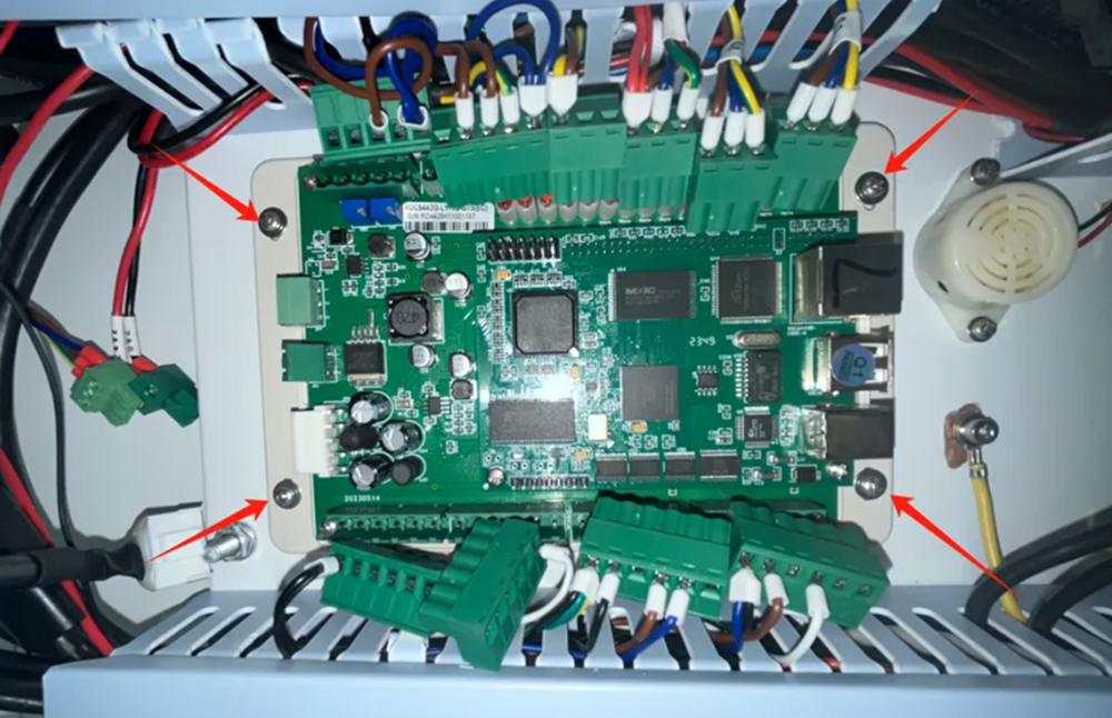 Unscrewing and removing old Hydra control card