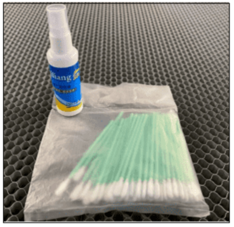 Hydra Series lens cleaner and cotton swabs from the tool box