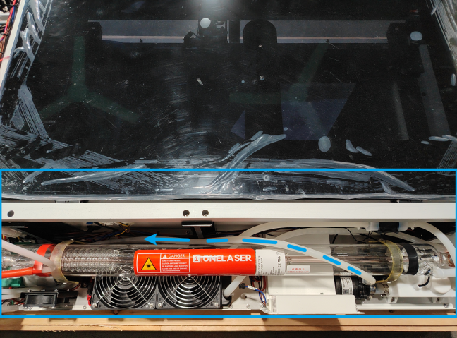 Water flowing through laser tube system after chiller activation