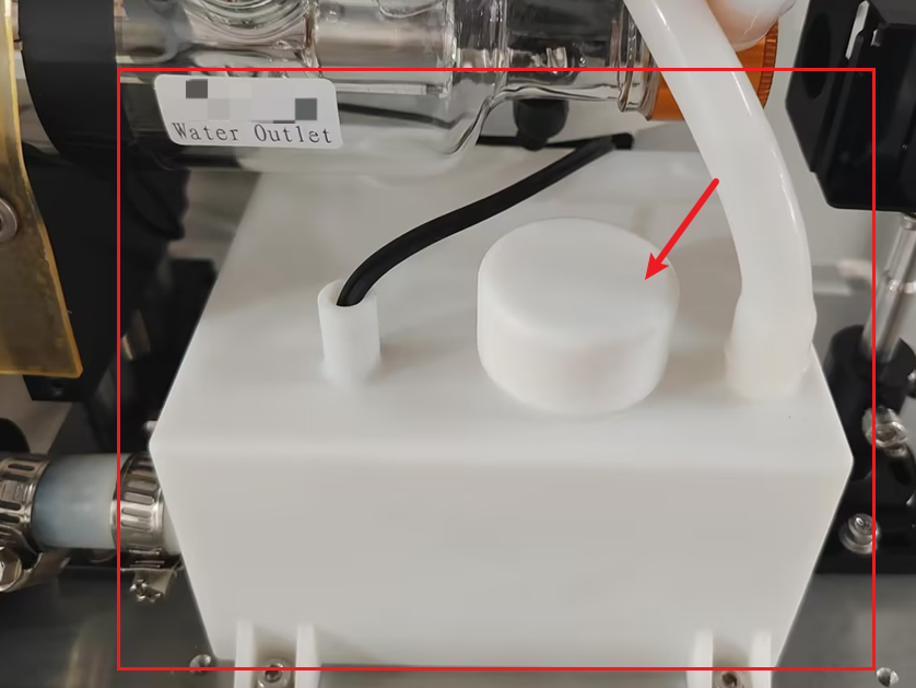 Opening chiller water cap on OneLaser XT and adding pure water