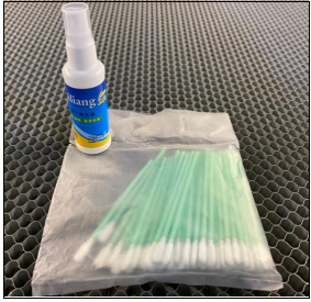 Optics cleaning kit including cleaner and cotton swabs