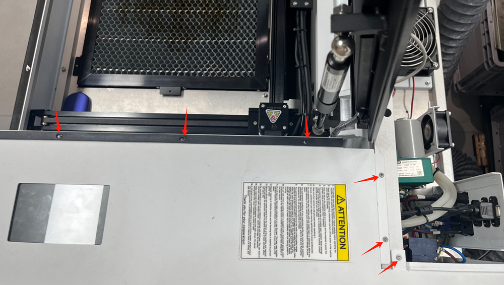 Right-side panel partially removed from laser machine