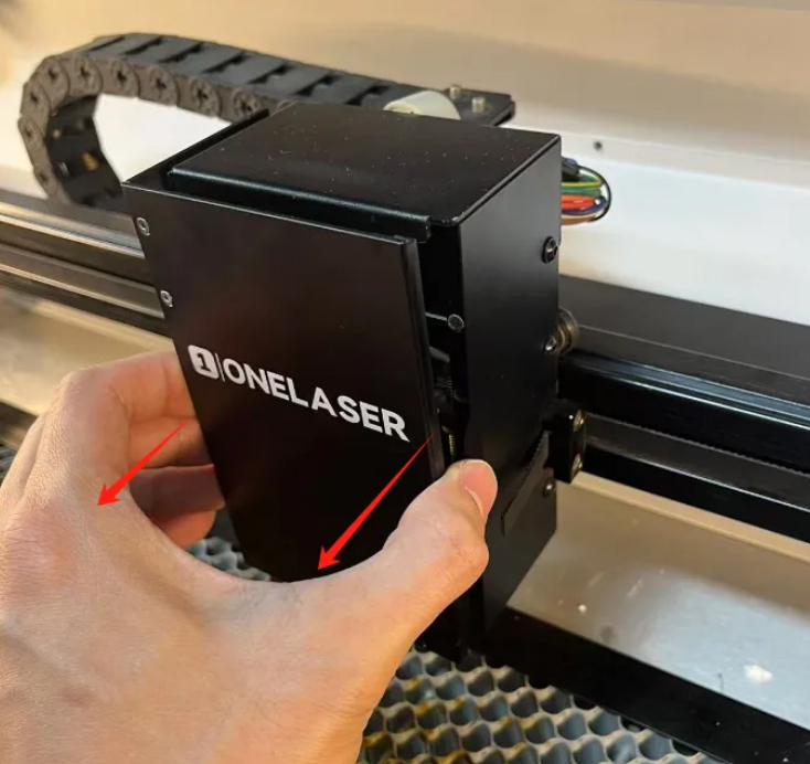 Remove front cover of laser head