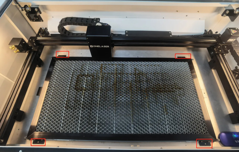 Remove four screws with 2.5 mm Allen key