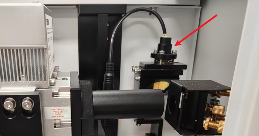 Check red light indicator socket inside laser head