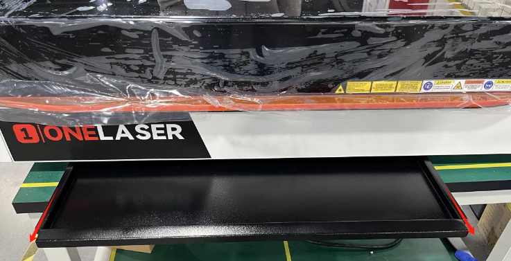 Remove the waste drawer and empty its contents