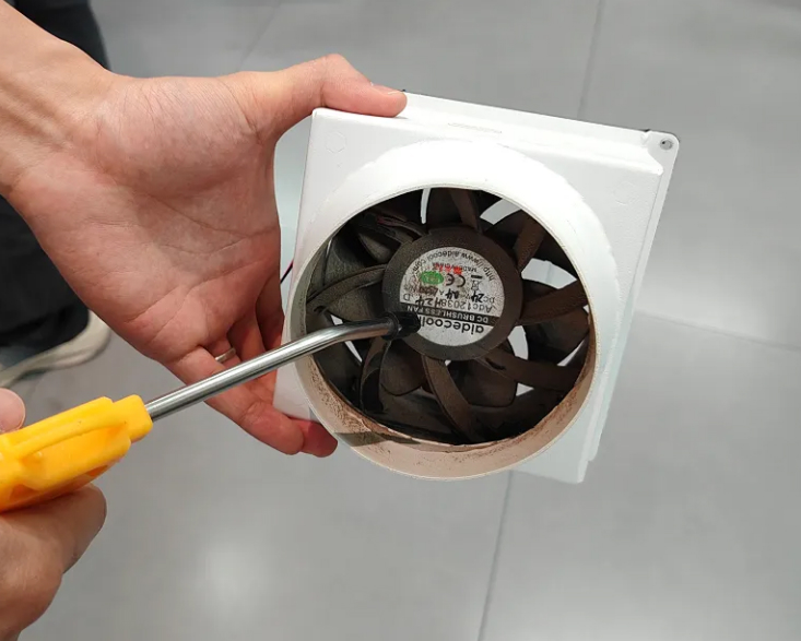 Use an air gun to blow dust off the fan blades