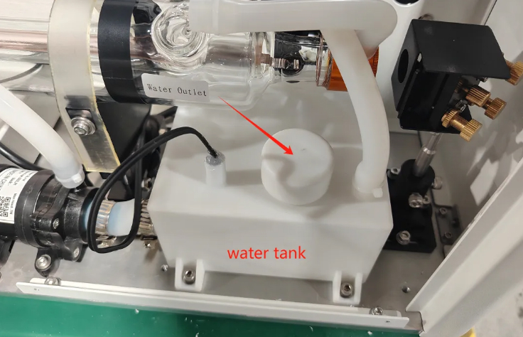 Turn the water tank cap counterclockwise to open it