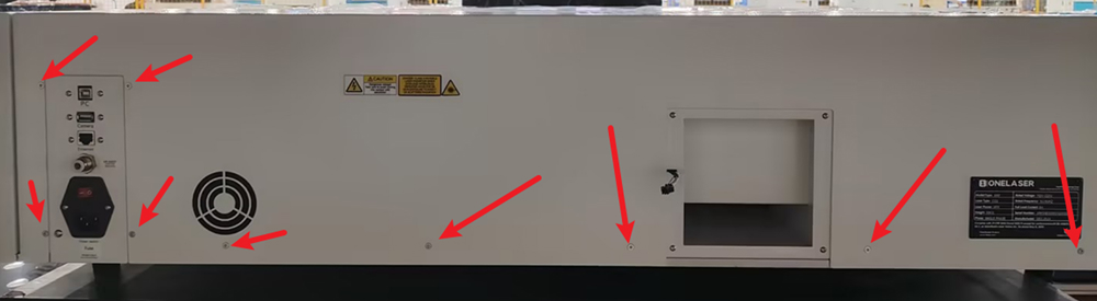 Removing rear cover screws of laser machine casing