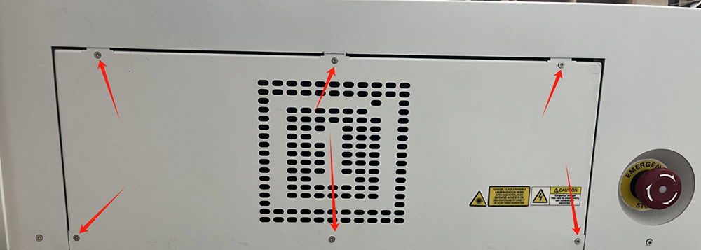 Removing right side cover of laser machine