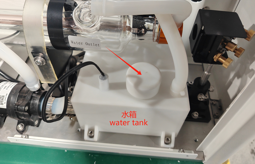 Unscrew laser water tank cap