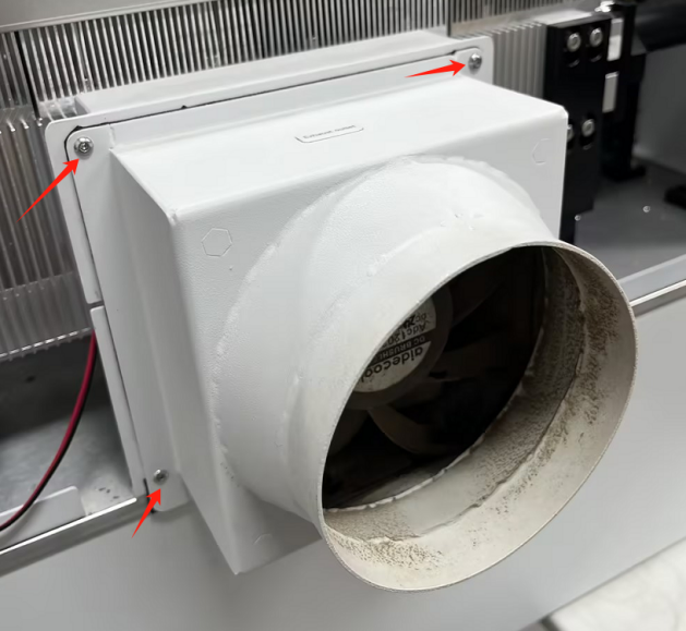 Removing screws that secure the X Series exhaust fan