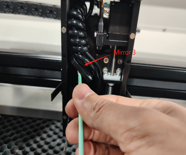 Cleaning mirror 3 near the X Series laser head