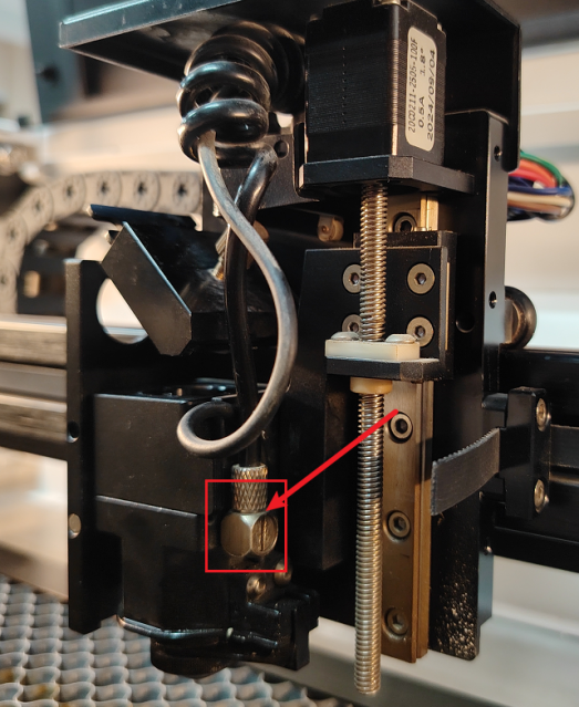 Close-up of the X Series air pipe screw before adjustment