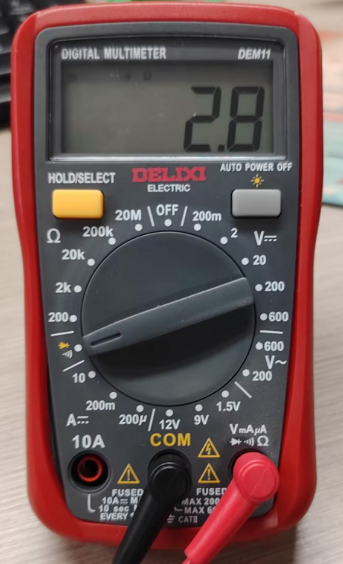 multimeter showing connected power cord