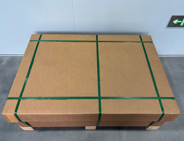 Cutting the cable tie during OneLaser X Series unboxing step 1