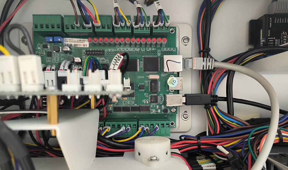 Plugging in original USB cable for testing